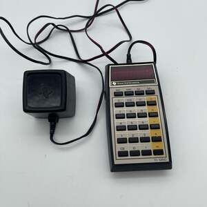 Vintage Texas Instruments TI-1250 Electronic Calculator with AC 9180 Adapter